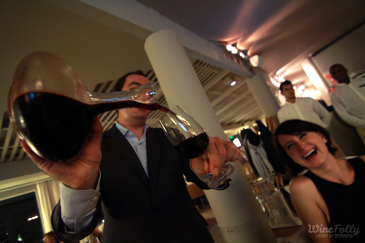 sommelier-pouring-vintage-port-wine-from-decanter sommelier-pouring-vintage-port-wine-from-decanter